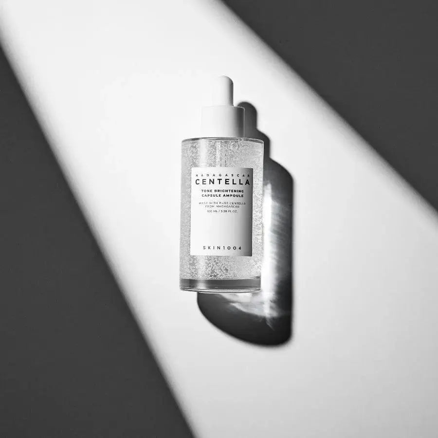 أمبولة SKIN1004 Madagascar Centella Tone لتفتيح البشرة، 100 مل، خلاصة مصل العناية بالبشرة الكورية 
